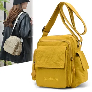 Waterproof Nylon Crossbody Bag Multi-Pocket Casual Shoulder Bag Embroidered Travel Messenger Bag For Men Women