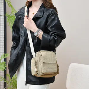 Multi-pocket waterproof casual canvas crossbody shoulder bag for daily outdoor travel use