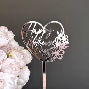 Mother's Day acrylic cake topper with heart and floral design, perfect for party desserts.