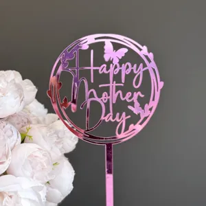 Detailed shot of a pink mirror acrylic Happy Mother's Day cake topper with cute butterfly design.
