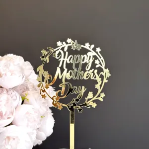 Gold acrylic Mother's Day cake topper with floral wreath design, ideal for party dessert decor.