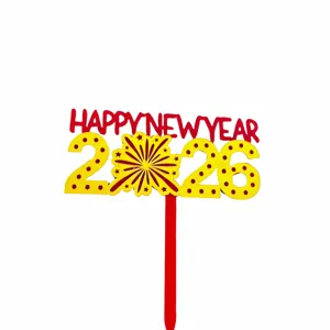 Detailed view of the 2026 New Year cake topper with red and yellow acrylic design.