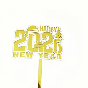 Gold acrylic 2026 New Year cake topper with happy new year text for party decoration.