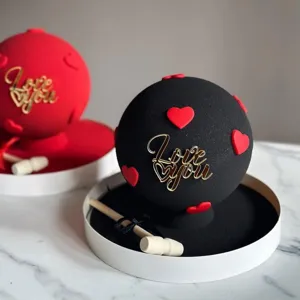 Valentine's Day cake decoration with Love you acrylic topper and mini wooden hammer set.