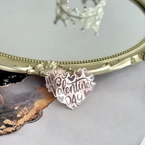 Detail shot of heart acrylic cake topper valentine day party dessert decoration clear design