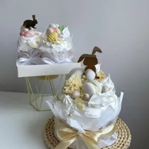 Easter bunny cake topper acrylic set with eggs and macaron decorations for holiday party desserts.