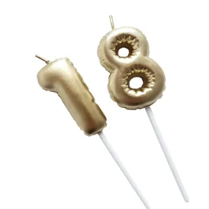 Gold number 18 birthday candle cake topper balloon style for party celebration and new year.