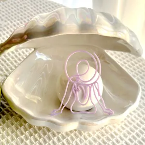 Creative pearl shell decorative ornament with pink line art sculpture for home desktop decor.