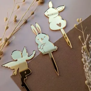Gold mirror acrylic Easter rabbit cake topper set, elegant bunny design for party cupcakes.