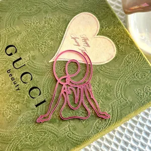 Pink acrylic abstract line art cake topper for women's day and mothers day celebrations.