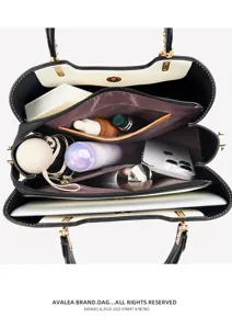 Color block women tote bag interior capacity detail showing multiple compartments and pockets for daily use