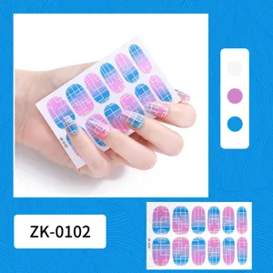 Gradient geometric nail art stickers, stylish pink and blue grid design detail view.