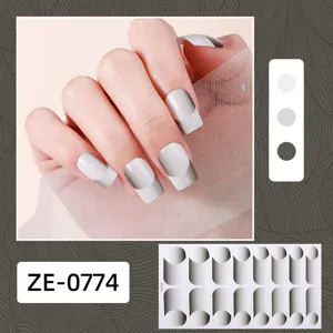 French gradient grey nail wraps detail, elegant manicure sticker sheet close-up design.