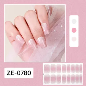 Detailed view of sparkly pink gradient nail polish wraps featuring a shimmering glitter effect.
