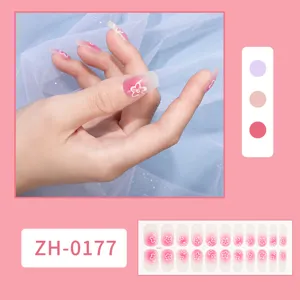 Set de pegatinas para uñas con flores blancas rosas degradadas y muestras de color.