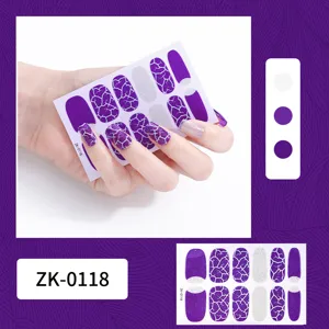 Purple and silver cracked glitter nail wrap detail showing close-up application on hand.