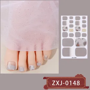 Zomer grijze teennagelsticker set met glitters en abstracte kunstpatronen voor voetdecoratie.
