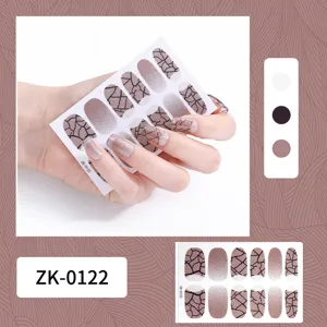 Full wrap nail stickers featuring trendy pink gradient and black cracked pattern for chic nail art.