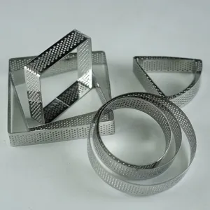 Stainless steel perforated tart rings set for baking French mousse cakes and delicious desserts.