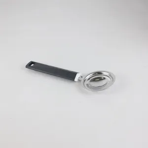 Stainless steel kitchen gadget egg white separator with anti-slip gray handle detail