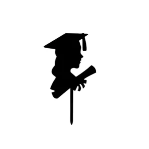 Close-up detail of black acrylic graduation female silhouette cake topper decoration party item.