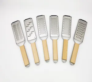Stainless steel cheese grater with wood handle for lemon and chocolate detail view