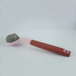 Long handled silicone cleaning brush for kitchen dishes and pots with hanging hole design.
