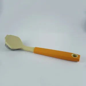 Detailed view of the kitchen cleaning brush with dual-color long handle and scraper head.