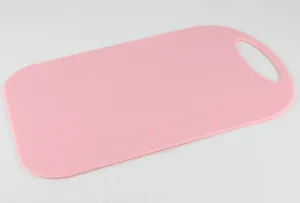 Pink plastic cutting board, non-slip PP kitchen fruit chopping block with hanging hole detail.