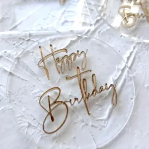 Acrylic Happy Birthday cake topper, transparent double layer party decoration detail.