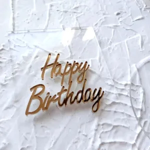 Clear double layer acrylic happy birthday cake topper detail, elegant party decoration.