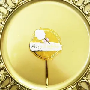 Acrylic Happy Birthday cake topper with gold lines and cotton candy design for party decor.