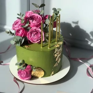 Ins style green birthday cake decoration acrylic round sign with pink roses and gold candles.