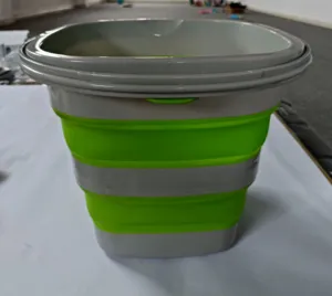 Portable collapsible bucket in grey and green, ideal for outdoor fishing, car washing and storage.