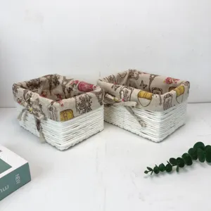 Lot de 2 paniers de rangement en osier blanc avec doublure en tissu vintage pour la maison.