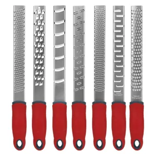Stainless steel cheese grater kitchen set with red handle, multi-functional tool for zesting.