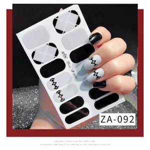 Black and white geometric nail art stickers set with trendy plaid designs for easy DIY manicure.