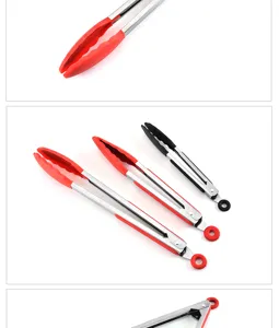 Stainless steel food tongs detail, red silicone gripping tip, heat resistant kitchen tool closeup shot.