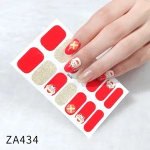 Red Japanese lucky cat nail art stickers detail view, showing shiny gold glitter and vibrant red.