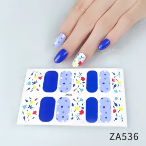 Blue and floral nail stickers detail view, stylish nail art wraps for easy DIY manicure.