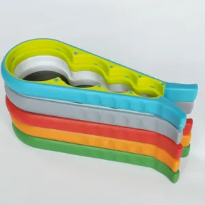 Multi-functional jar opener detail showing multi-color stack and four-in-one hole design.