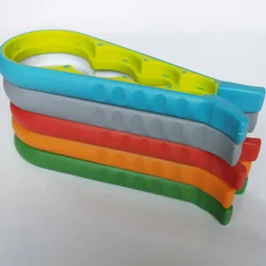 Detailed close-up view of multi-color multi-functional jar openers stacked together neatly.
