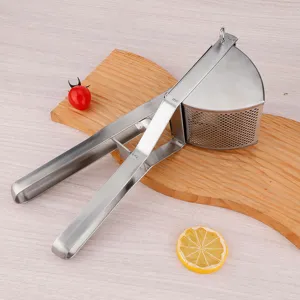 Durable stainless steel potato masher manual fruit juicer and lemon press kitchen tool.