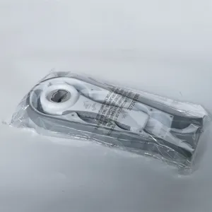 Multi-functional bottle opener detail view, showing the white and grey compact tool design.