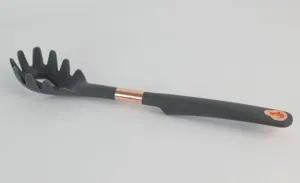 Silicone pasta server kitchen utensil with heat-resistant design and ergonomic non-slip handle.