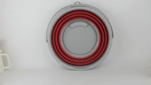 Portable collapsible bucket for outdoor fishing, car storage, washing, and general art use.