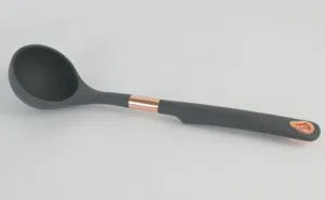 Grey silicone soup ladle detail with rose gold handle accent for kitchen cooking tools