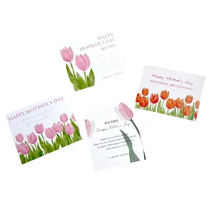 Close-up detail of watercolor tulip Mother's Day cards, paper greeting cards for cake decor.