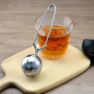 Stainless steel tea infuser ball with handle strainer for loose leaf tea brewing main view