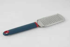 Stainless steel kitchen grater with ergonomic handle for cheese, vegetables and chocolate.